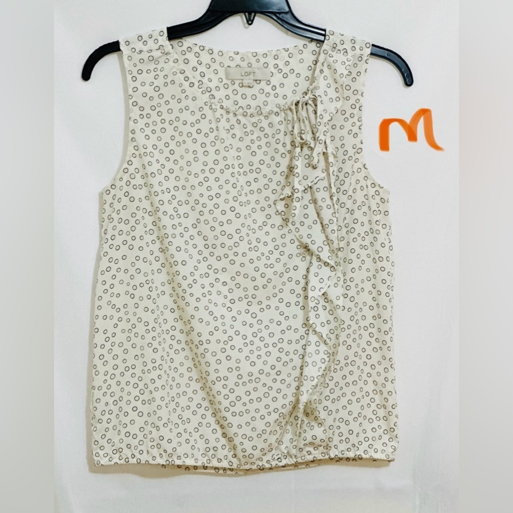 LADIES WHITE TOP WITH BLACK CIRCLE DESIGNS